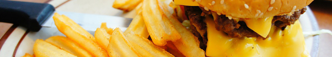 Eating Burger Hot Dog Cafe at Hot Rod Cafe restaurant in Kingman, AZ.